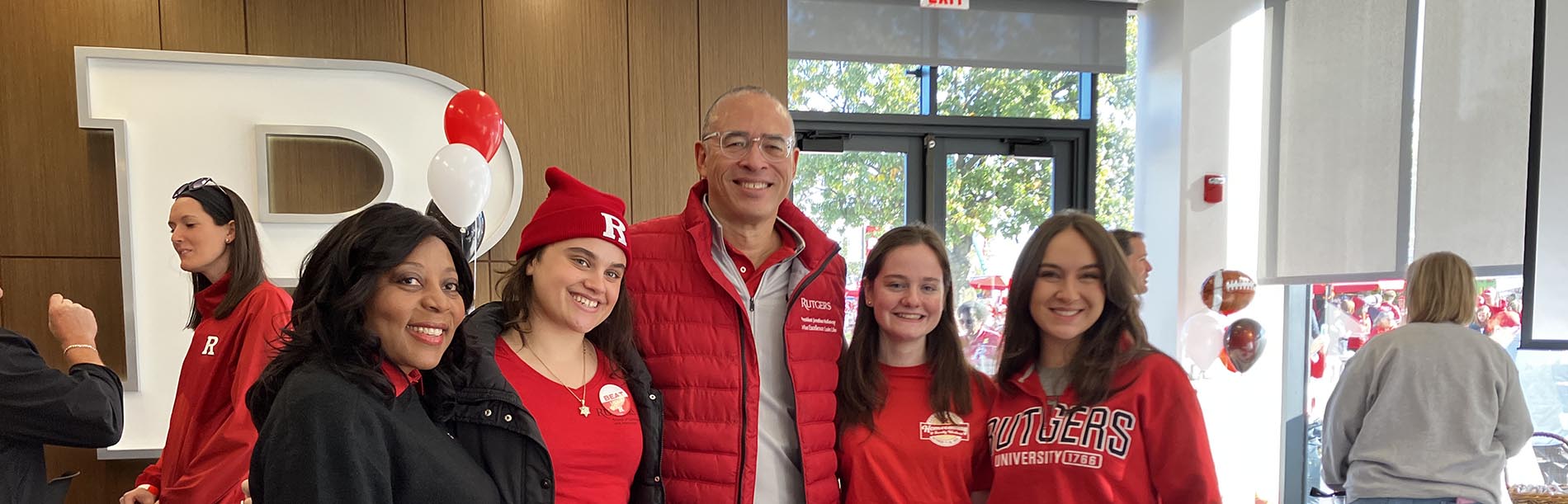 President Holloway with SC&I students at Rutgers Homecoming 2024