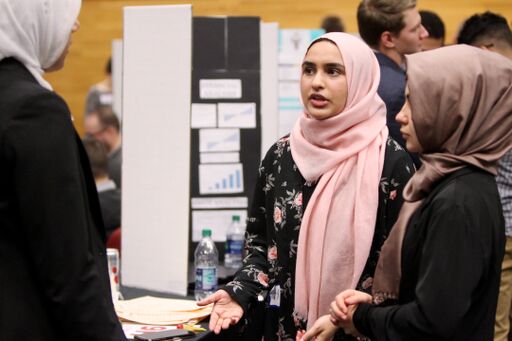 Fall 2018 women making a pitch at the ITI Showcase.