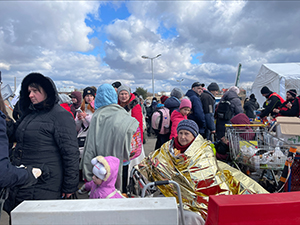 Alumnus T. Sean Herbert, an award-winning producer at CBS News in New York, spent the month of March 2022 reporting from the border of Ukraine and Poland.  