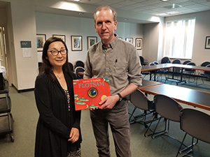 Dr. Junko Yokotoa, guest speaker who introduced the Silent Books collection at the Books as Bridges event at Alexander, with David Weisner