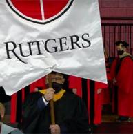 During the inauguration ceremony for Rutgers President Jonathan Holloway, Jon Oliver, who is assistant dean of information technology at SC&I and chair of the Rutgers University Senate, lead the procession to the stage, while carrying the Rutgers Gonfalon, an honor bestowed upon him as chair of the senate. 